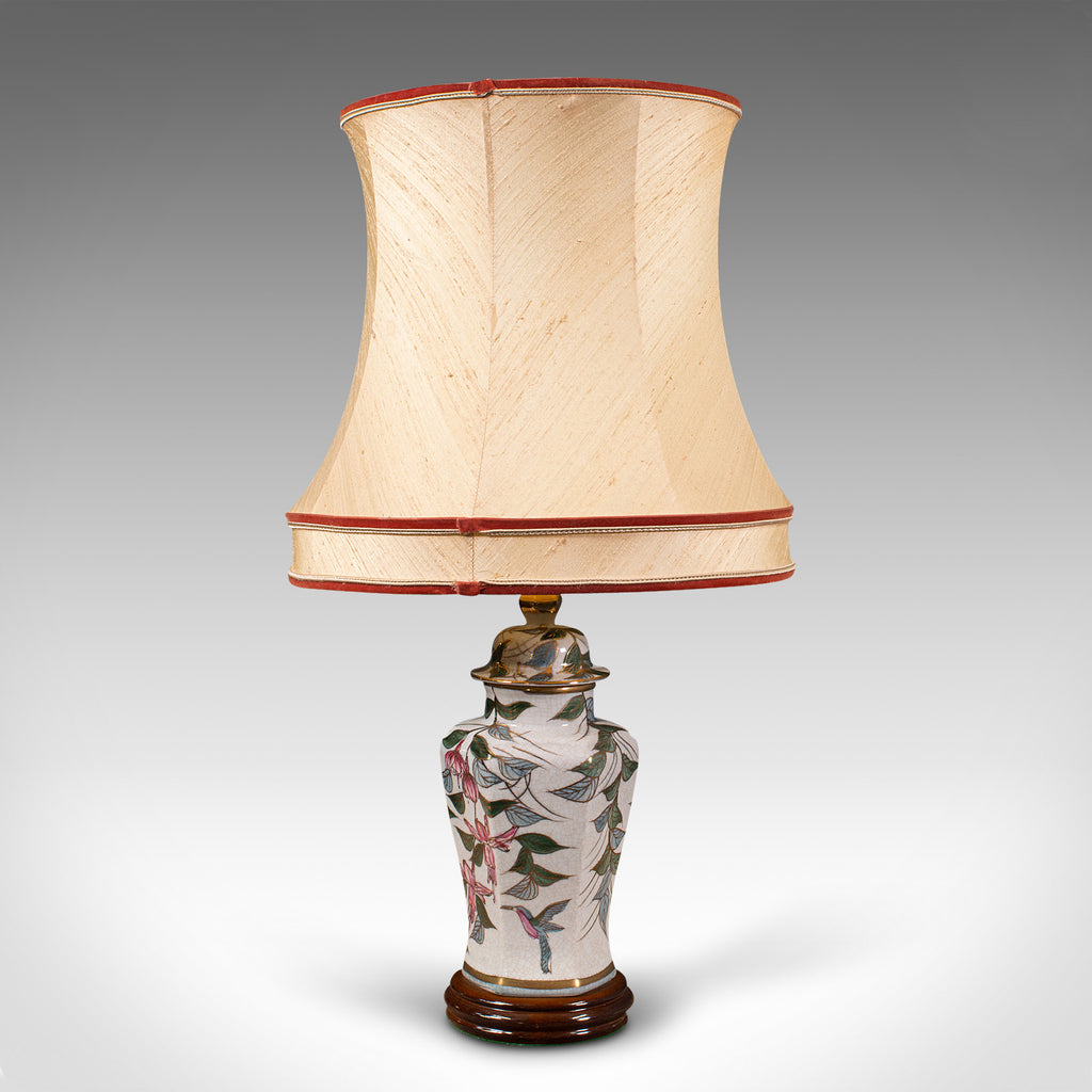 Antique ceramic lamps shop with flowers